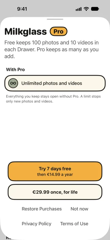 The Milkglass Pro offer in the app: “With Pro: Unlimited photos and videos”, a yearly price with a free trial, a one-time price, Restore Purchases, and links to the Privacy Policy and Terms of Use.